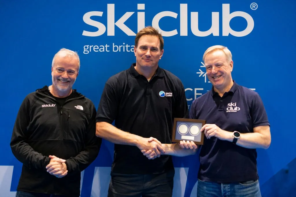Dan Charlish (centre) receives the Ski Club Pery Medal from James Gambrill and Angus Maciver